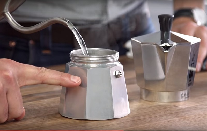 Open Moka Pot and add water