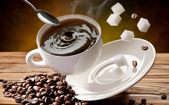 the habit of putting sugar in coffee
